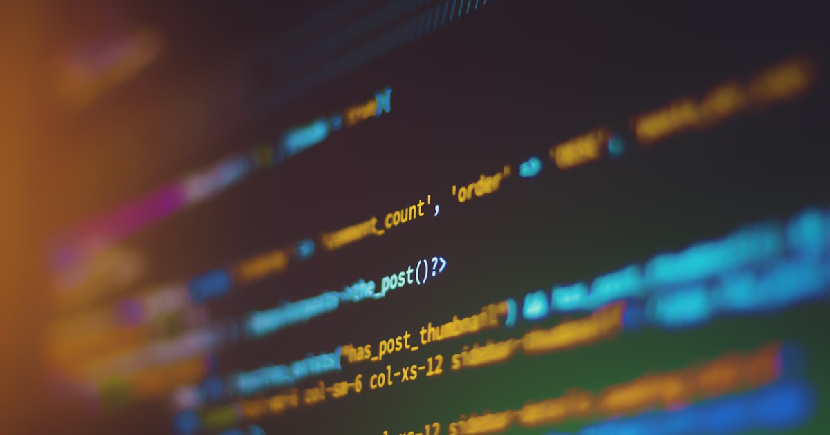 Code displayed on a dark monitor screen representing exposed API credentials